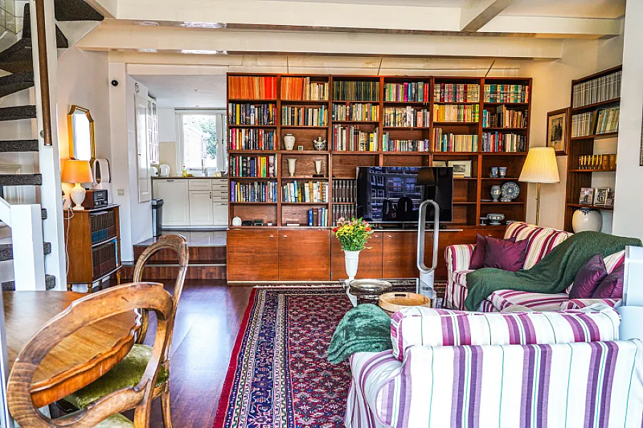 Living Area with Staircase and Kitchen View The Balcony at Prinsen Canal apartment Amsterdam