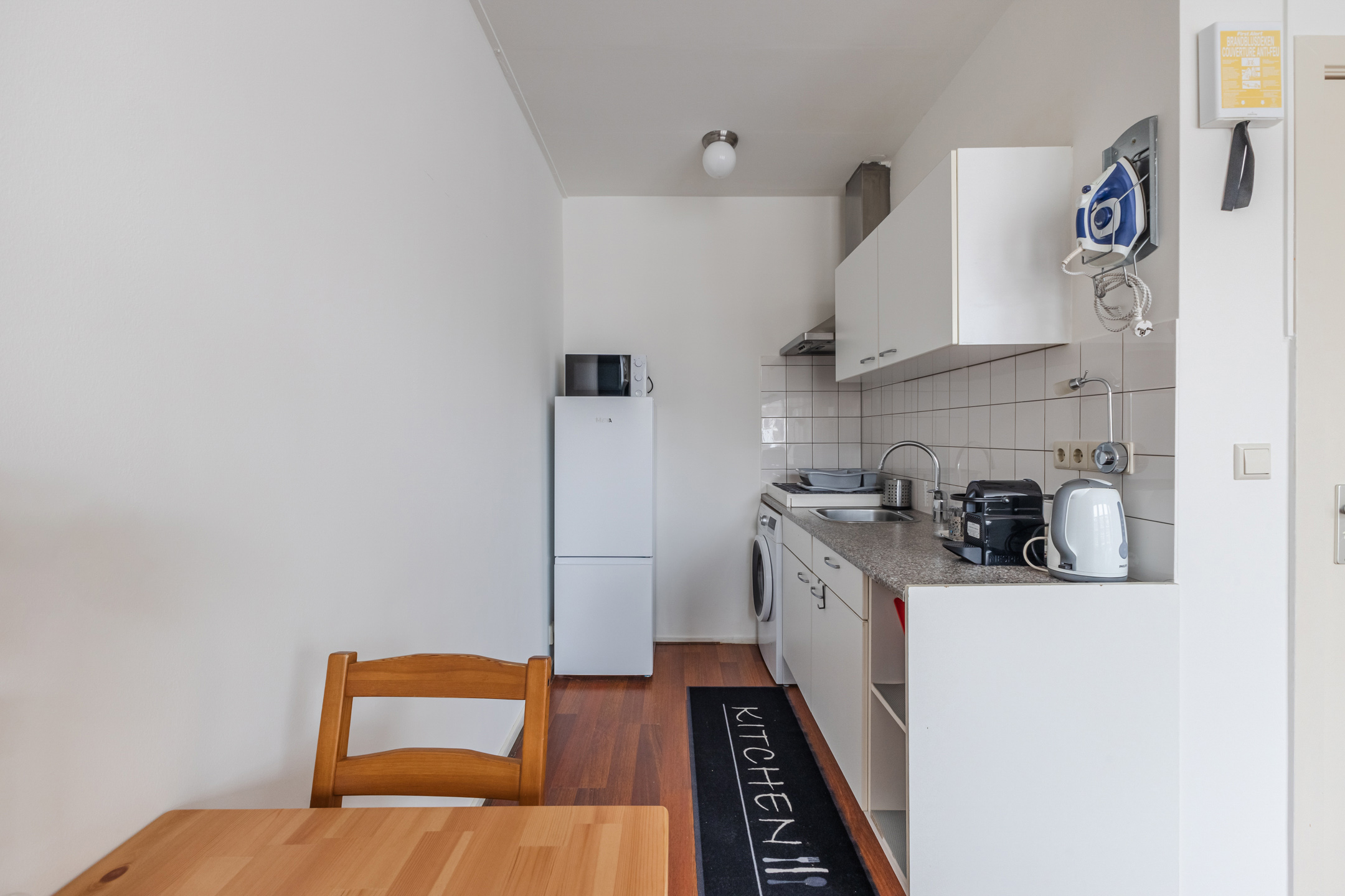 Dining with View of Kitchen Area Albert Cuypstraat III B studio Amsterdam